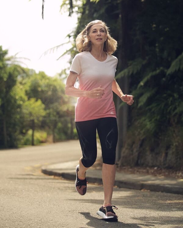 Kathrine Switzer running in adidas clothes
