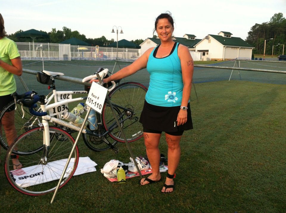 woman posing with bike falling-in-love-with-sport-Laura-Phelps-adidas-Gameplan A-bike-triathlon
