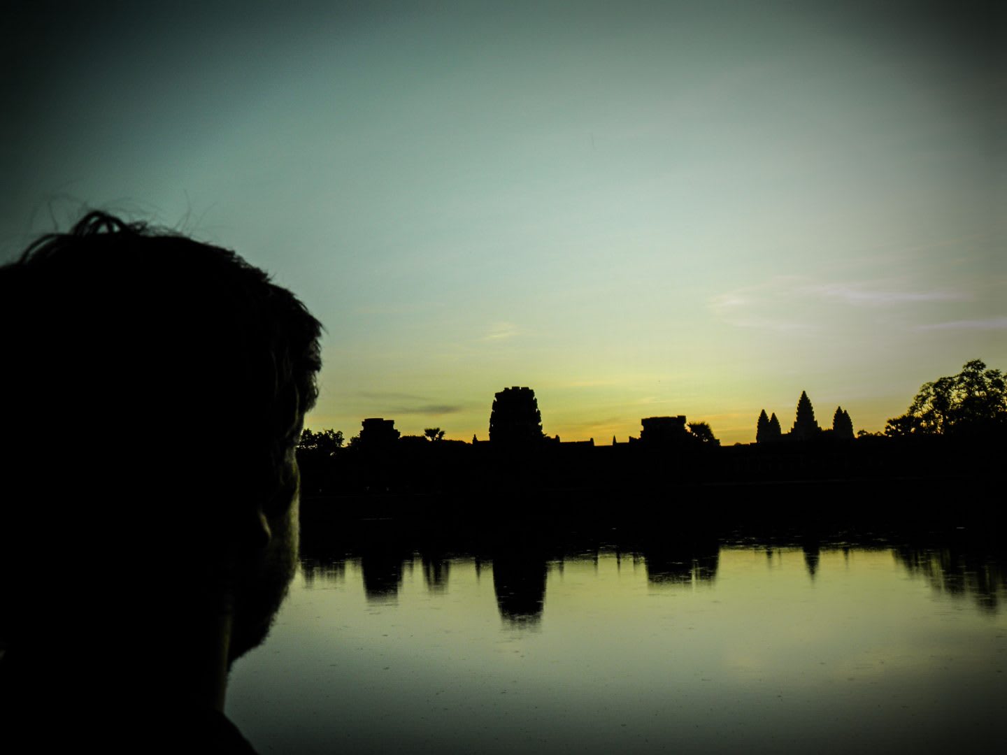 Guy watching the sunset in Angkor Wat