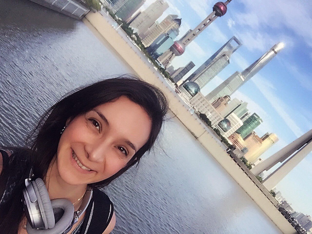 woman selfie in front of shanghai skyline trainee ditching stereotypes