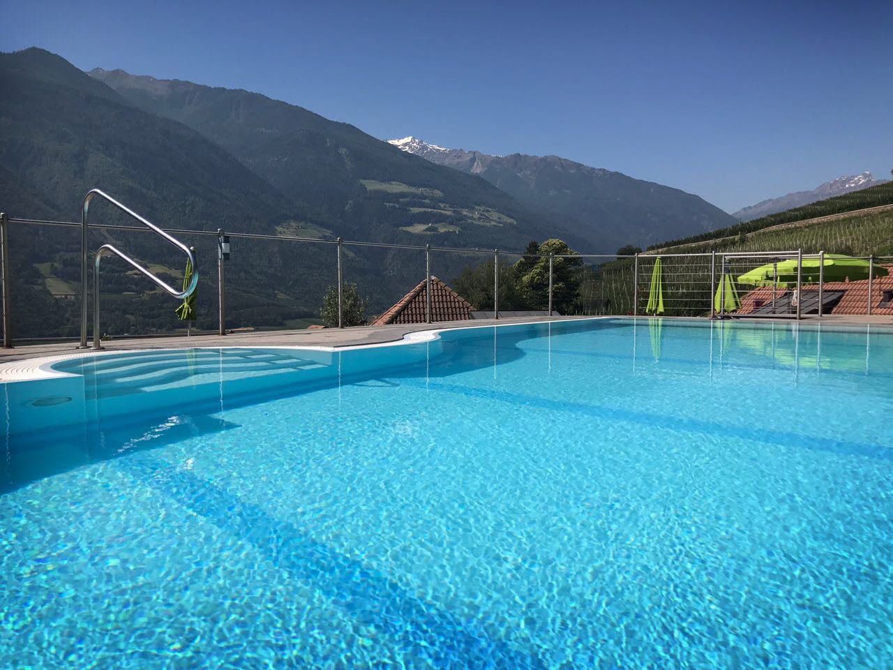 pool with mountain view active holidays relaxing unwinding