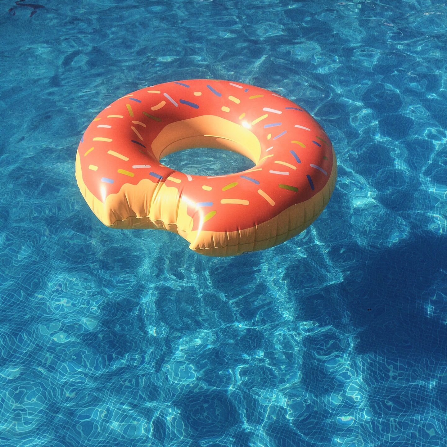 Close-Up Of Donut Shaped Inflatable Ring On Swimming Pool adidas GamePlan A Working outside