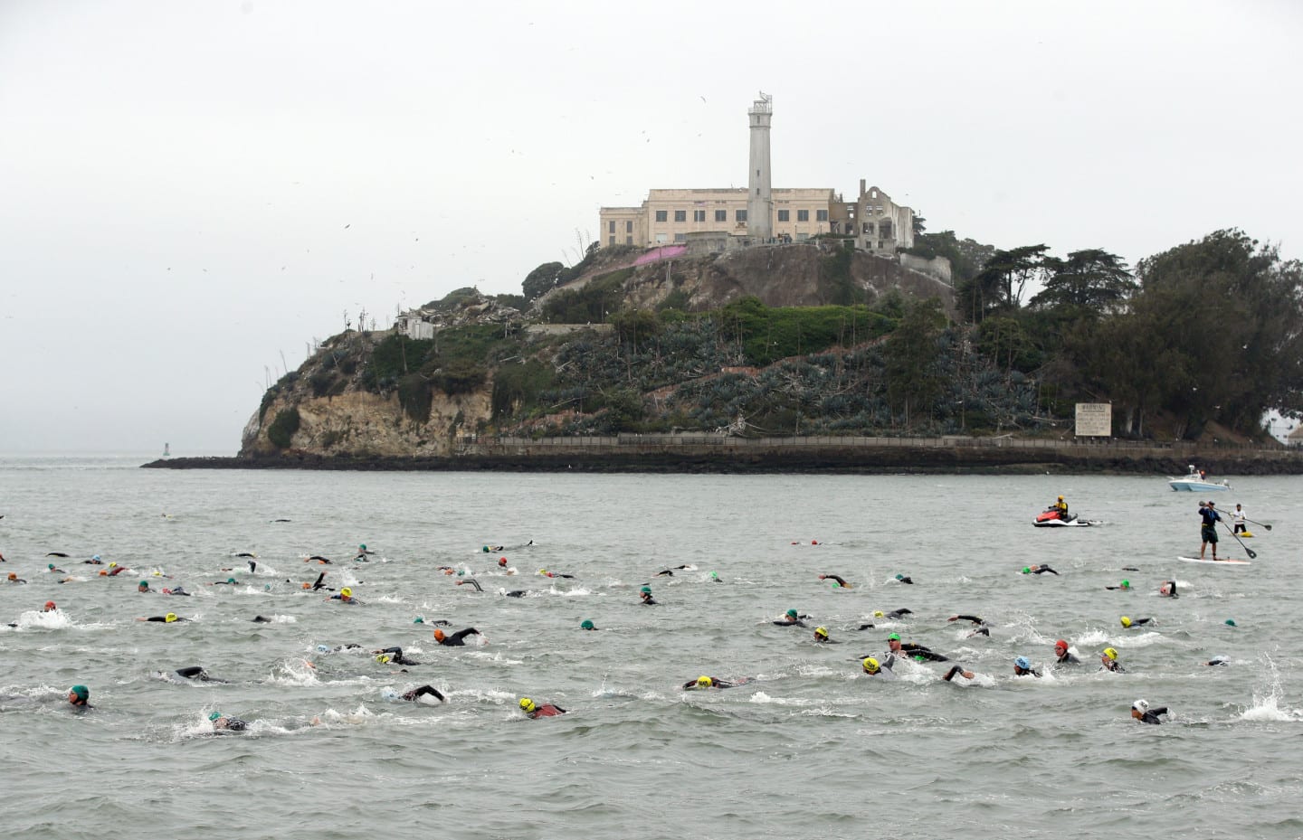 Escape from Alcatraz Triathlon_Island in the background_Swimmers in the Sea