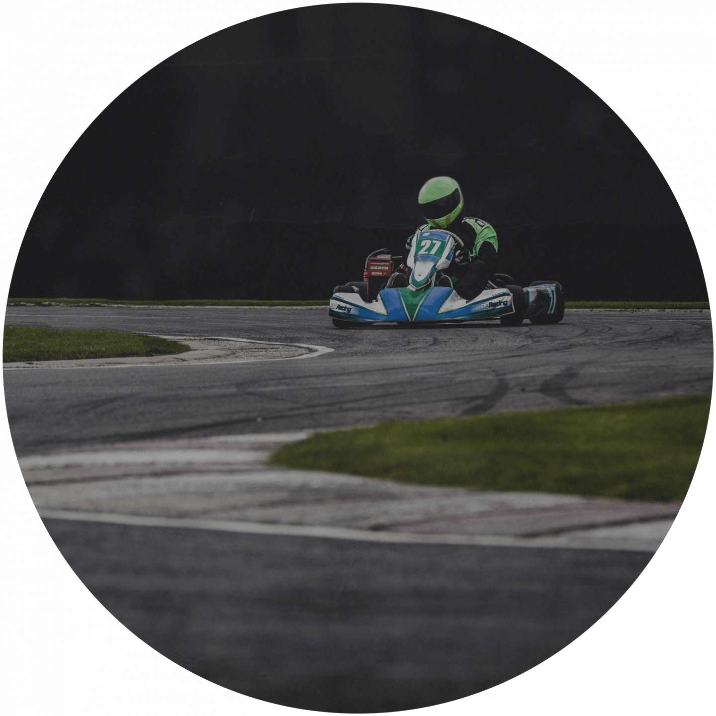 A person is racing in a cart on a curvy course. adidas, team building, GamePlan A, team, spirit, event