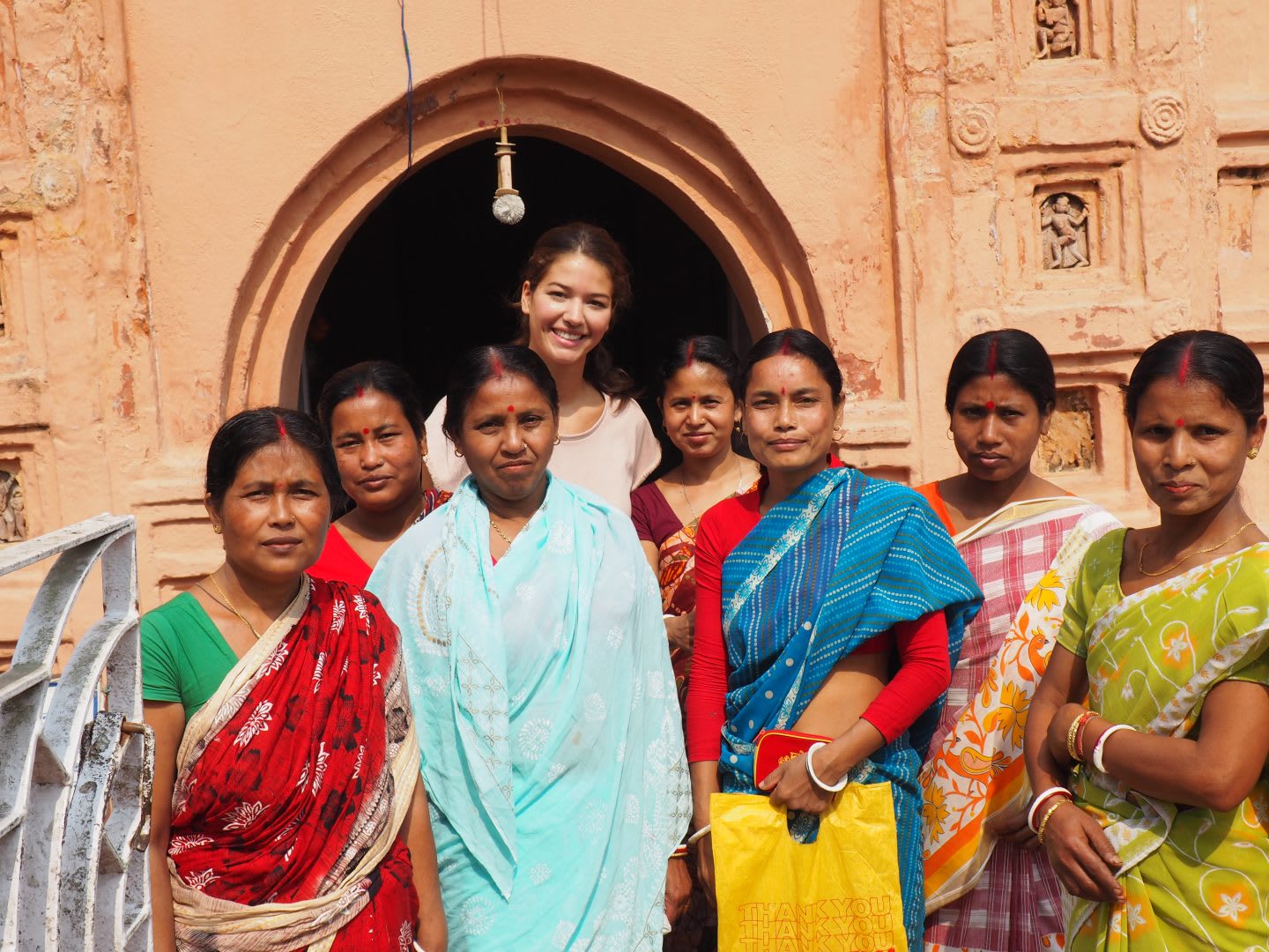 A group of woman stand together wearing traditional Indian clothing. family, culture, tradition, India