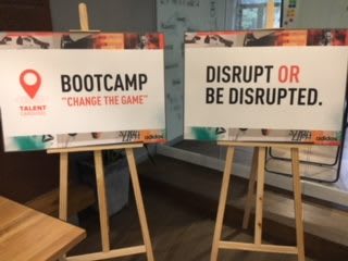 Two posters standing on easels at a bootcamp. adidas, talent program, disruption, coaching, leadership, Shanghai