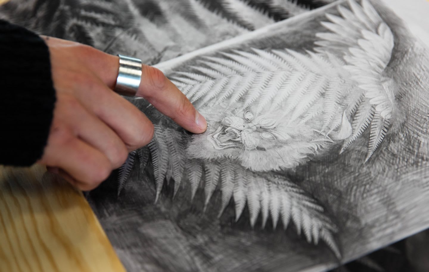 a hand pointing at a drawing, all blacks jersey, all blacks, rugby, adidas