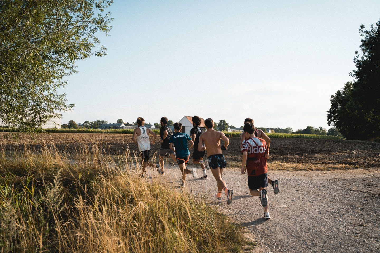 a group of people running outside