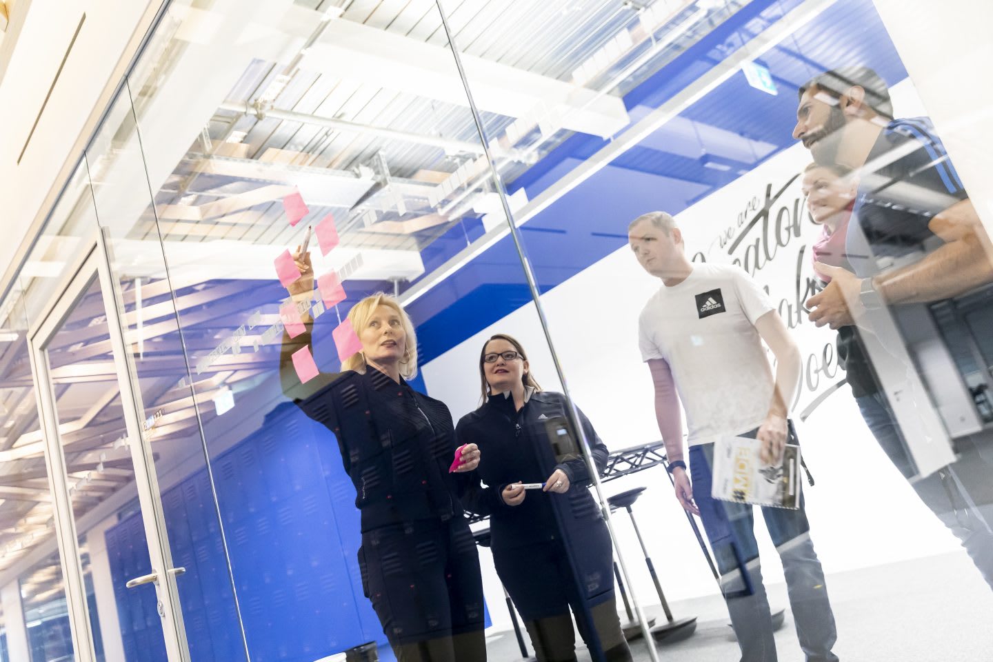 employees collaborating in a creative workspace