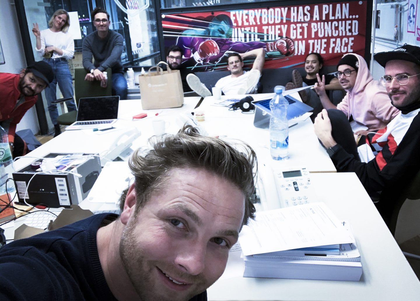 Selfie of a group of people in a conference room. How to build a creative workplace culture, JvM, workplace, collaboration, creativity, team-building, GamePlan A