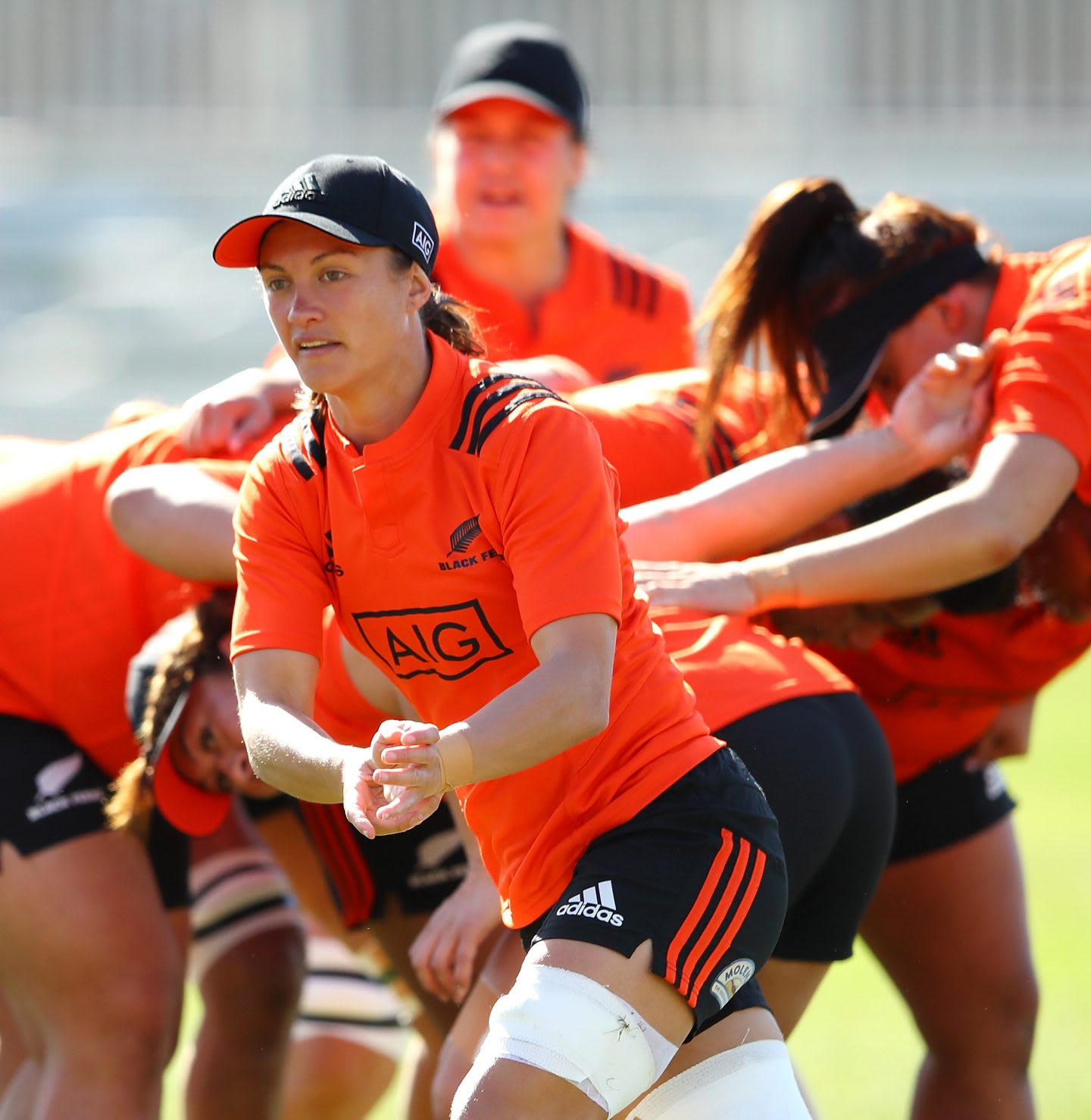 Rugby player Les Elder is throwing a ball in front of her team mates. finding purpose in life, Black Ferns, leadership, empowering girls