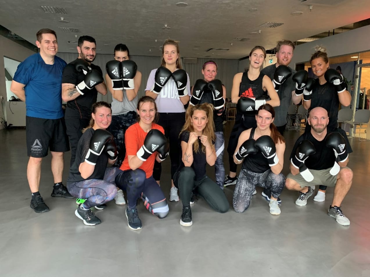 The adidas Nordics team in a group picture after a Night Fight class with Alexandra Pizzoni. Self-Care, adidas, Training, Workout, healtyish, GamePlanA.