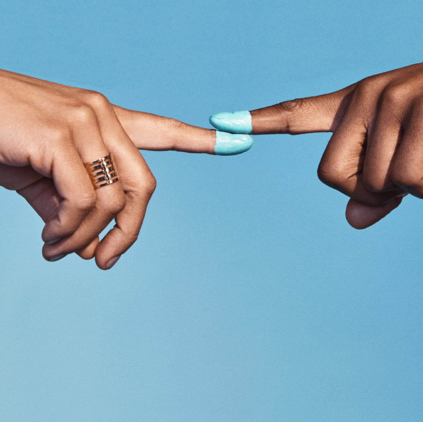 Two people touching the tip of index finger together, podcast, race, inclusion, sky