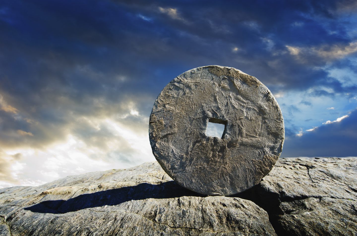 Ancient stone circle artefact against a blue sky background, USA, New York City, ancient, stone, circle