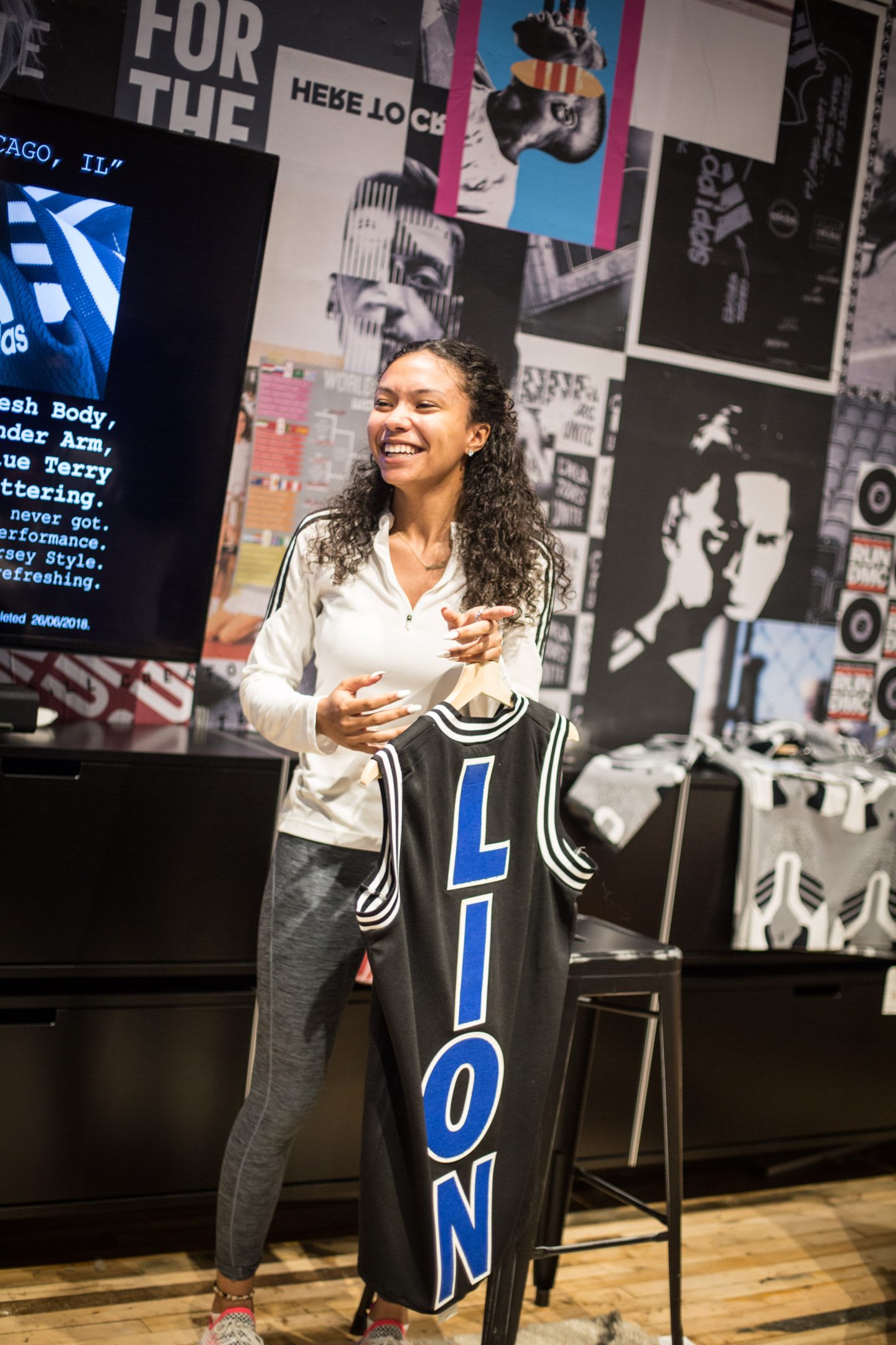 Girl presenting clothes in front of team at work, adidas, Brooklyn Creator Farm, NYC, New York City, designer, entrepreneur, Kim Aponi, GamePlan A