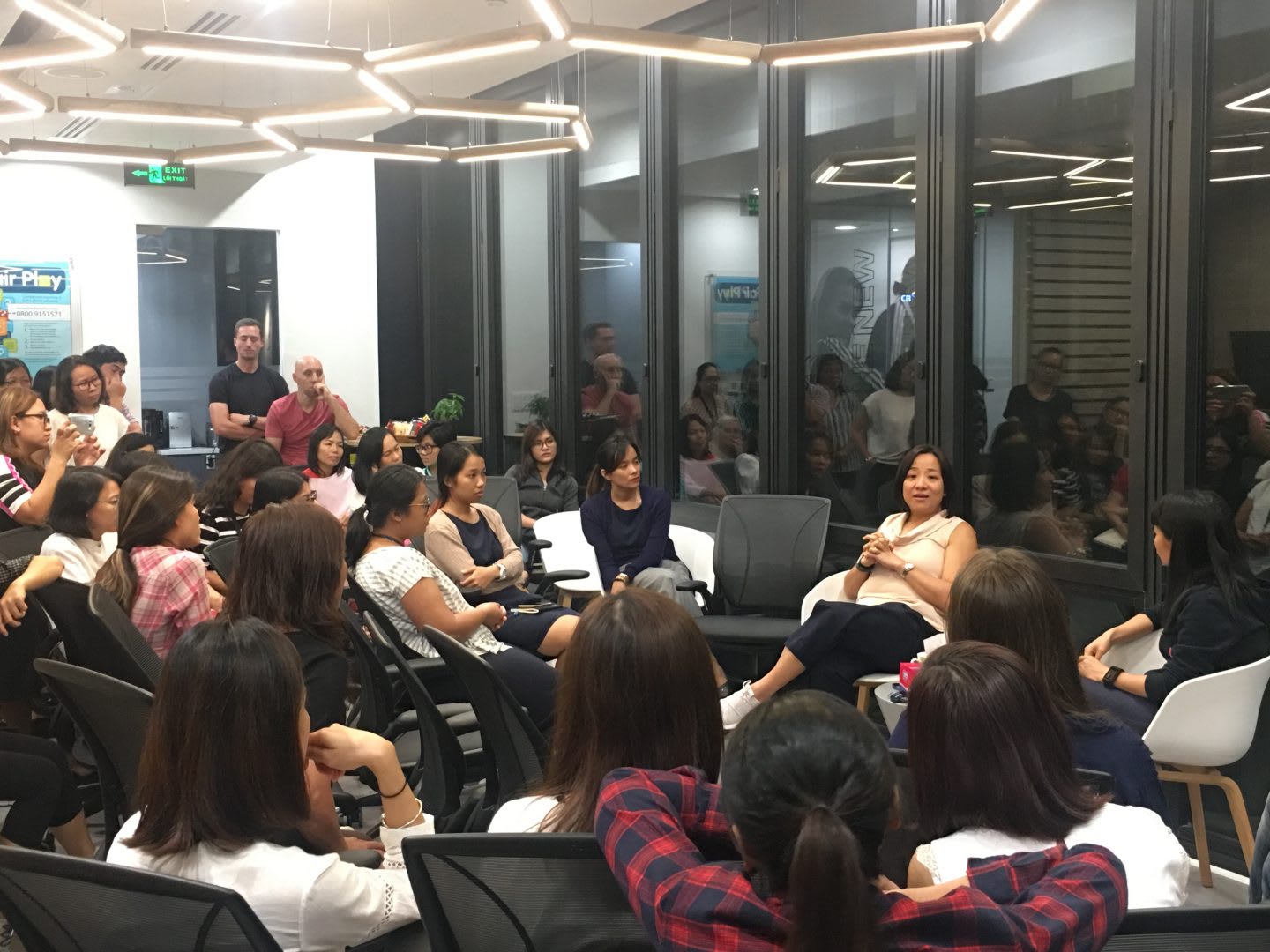 Woman speaking in front of a group of people, public speaking, talk, woman, leadership, Hoa Ly, adidas, employee, Sourcing