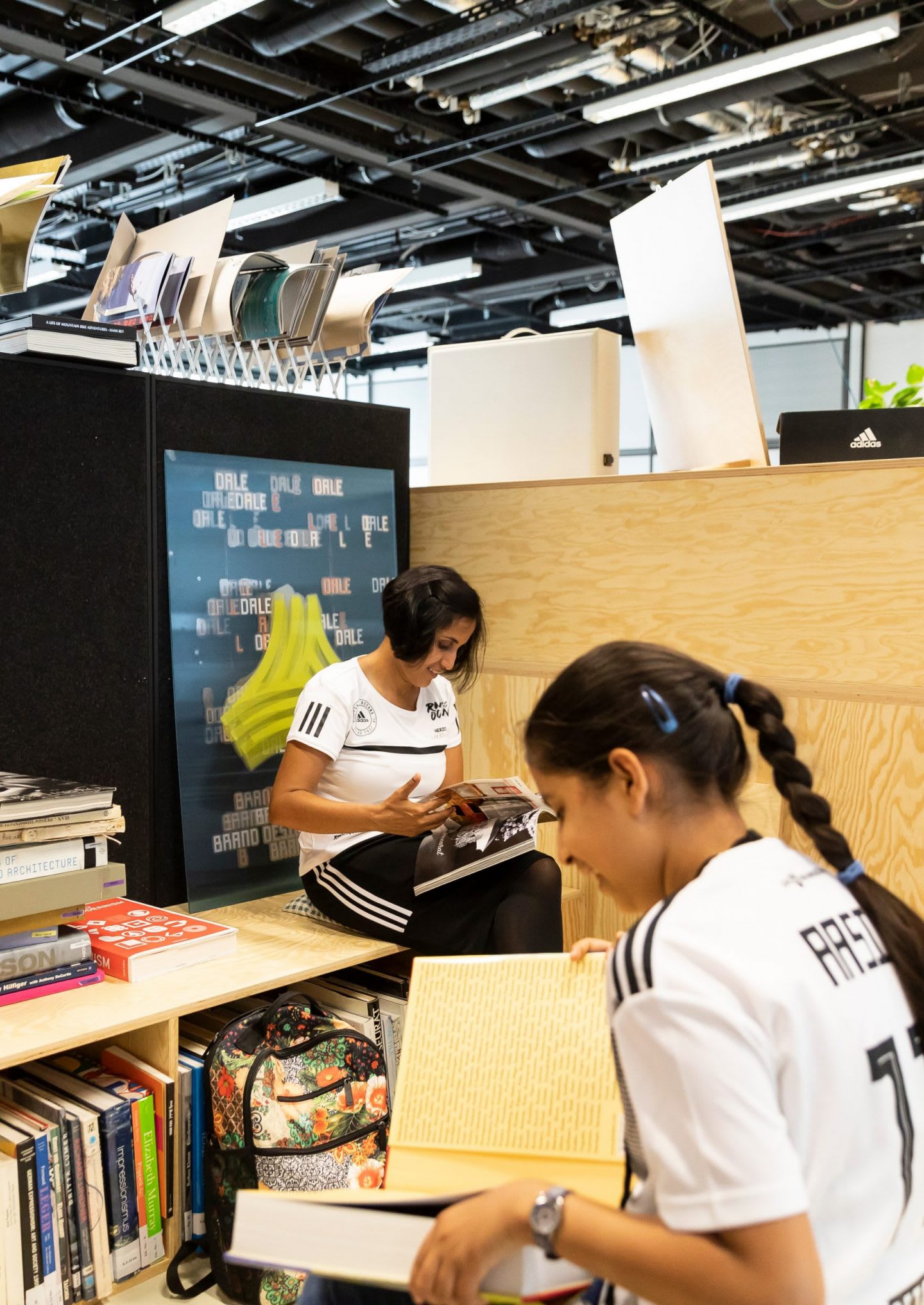 woman-girl-reading-bookshelf