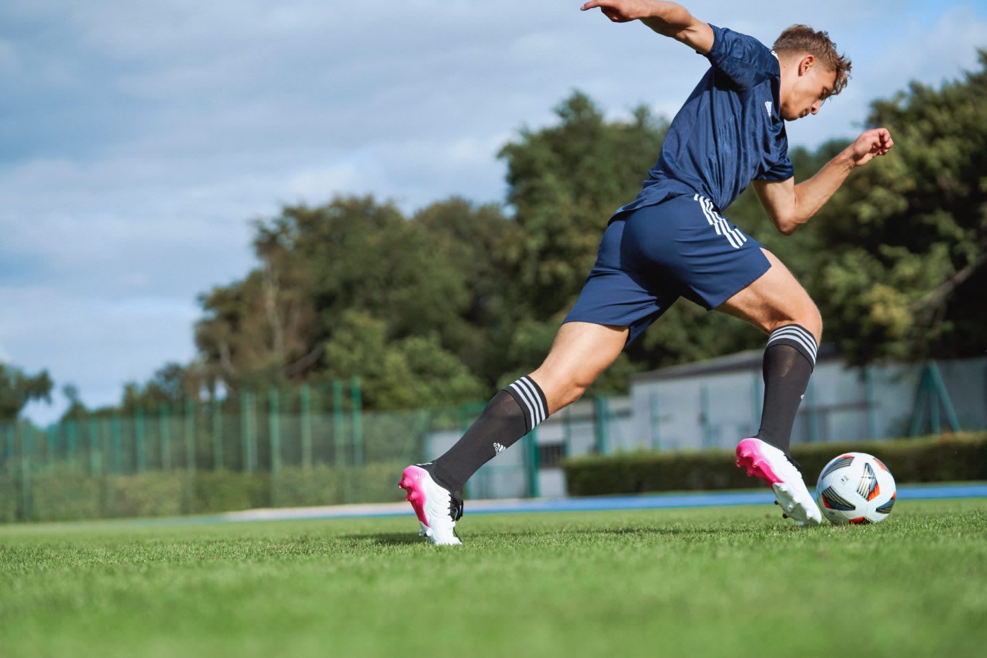 fotballplayer on the pitch
