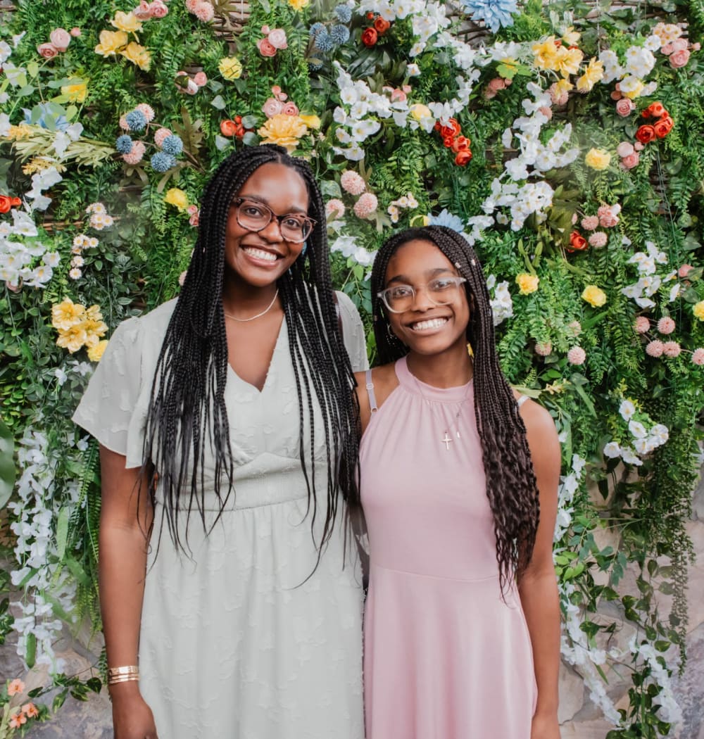 Two friends smiling together at Futures Gwinnett