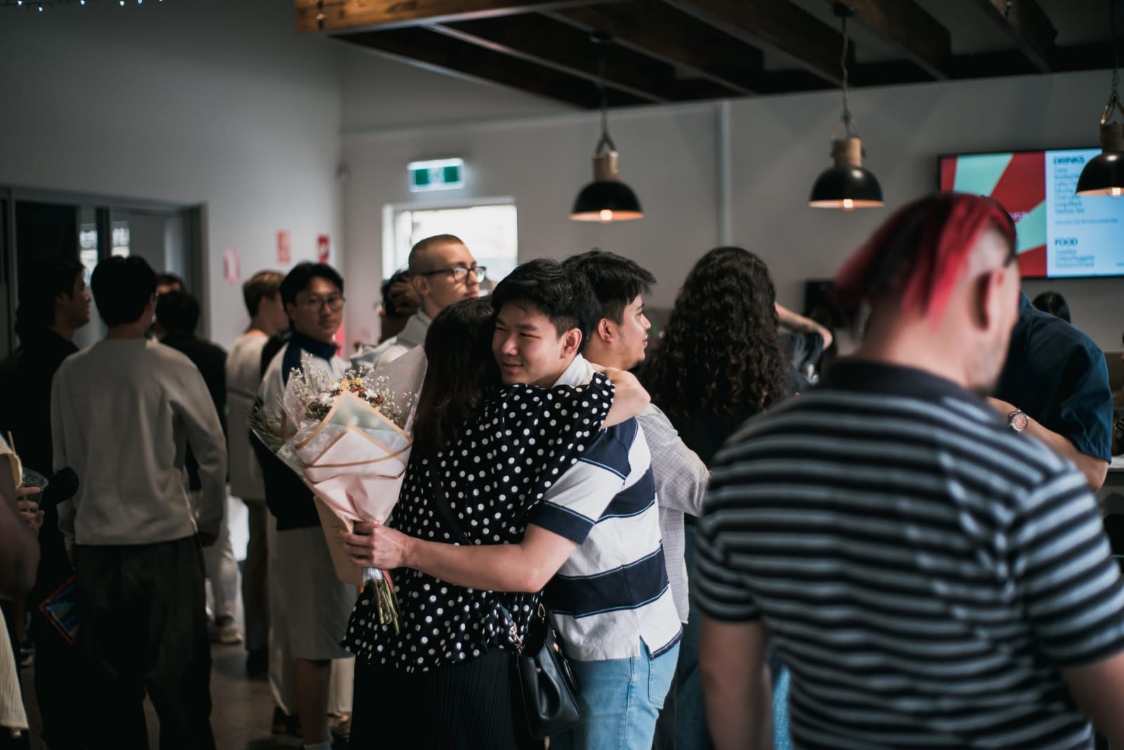 Asian Boy and Woman Hug Foyer Sunday