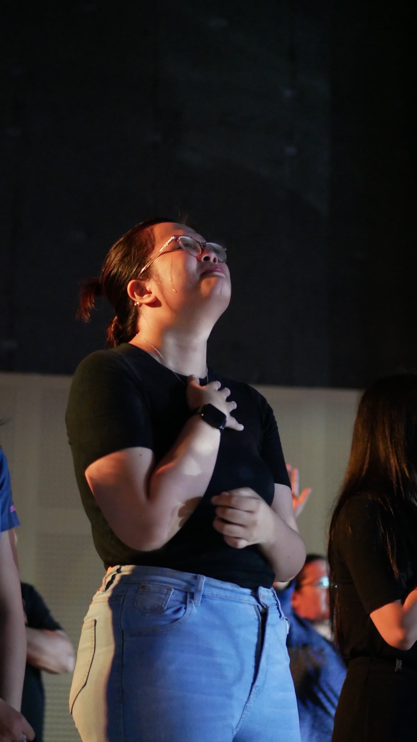 Bali woman in worship crying