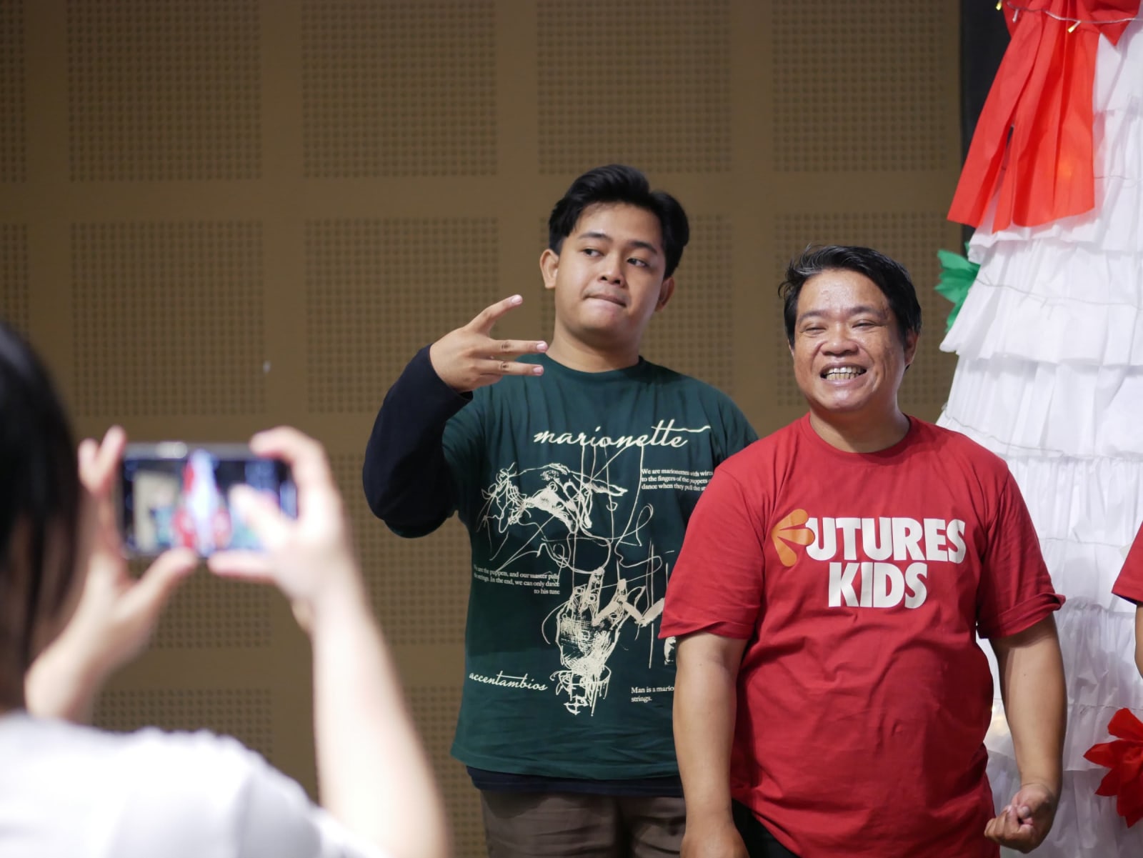 bali father and son in kids uniform taking photo