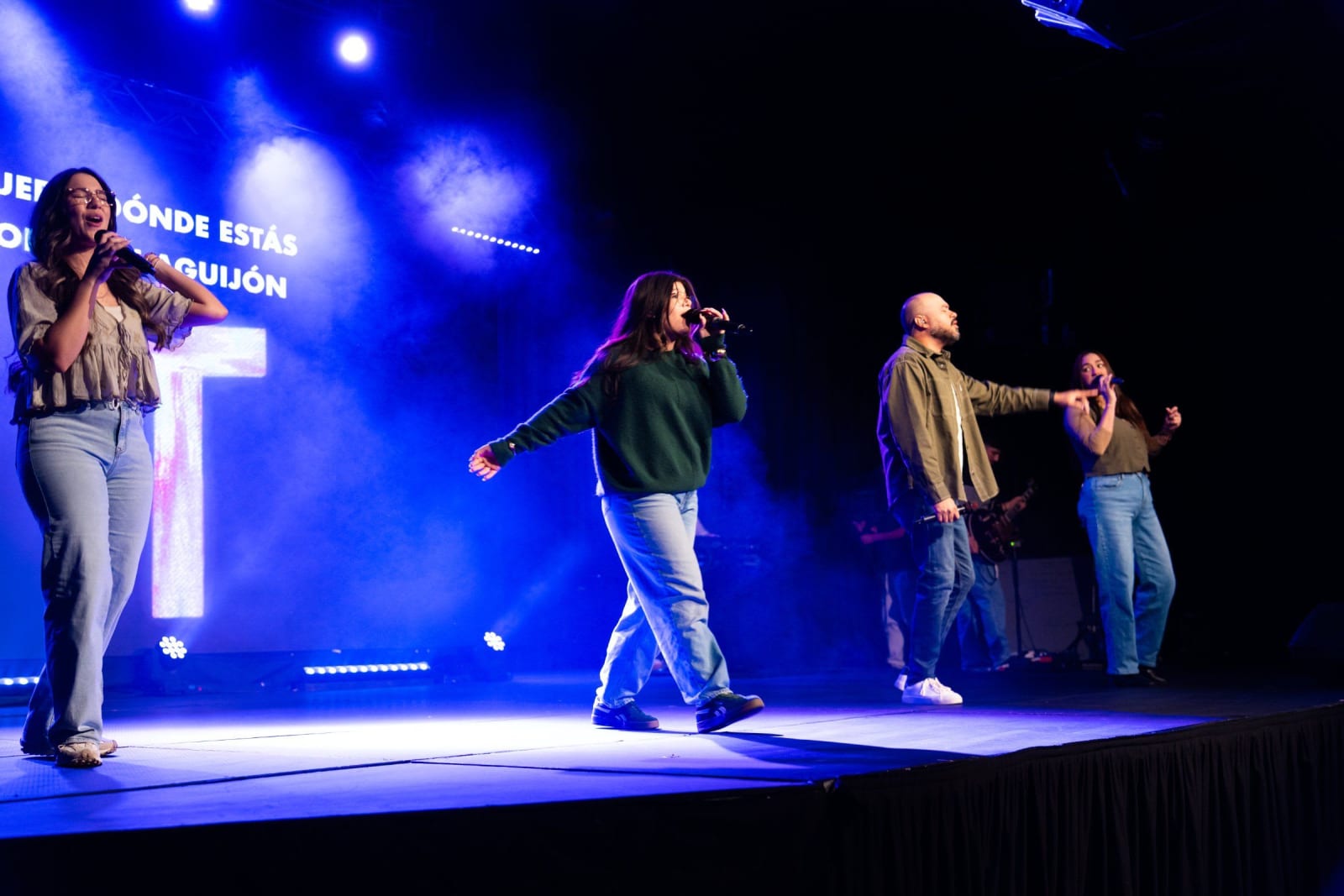 Singers leading worship on stage / duluth
