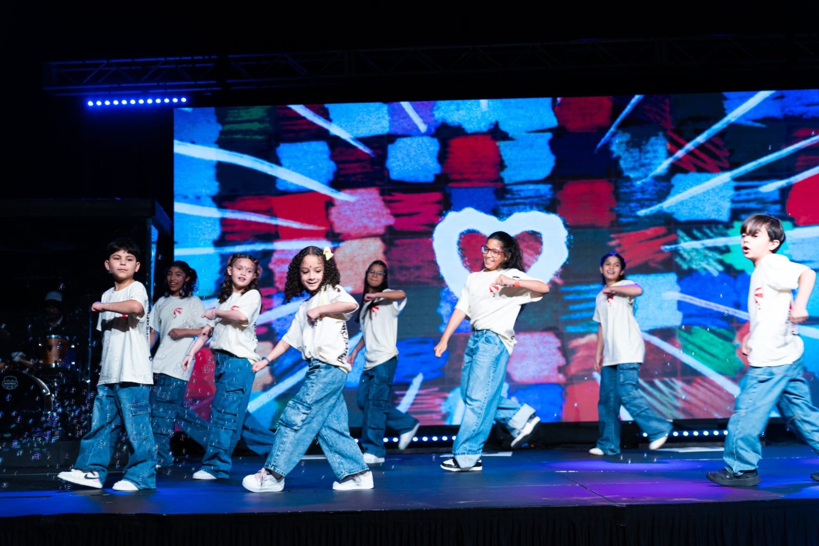 Children performing a dance on stage / duluth