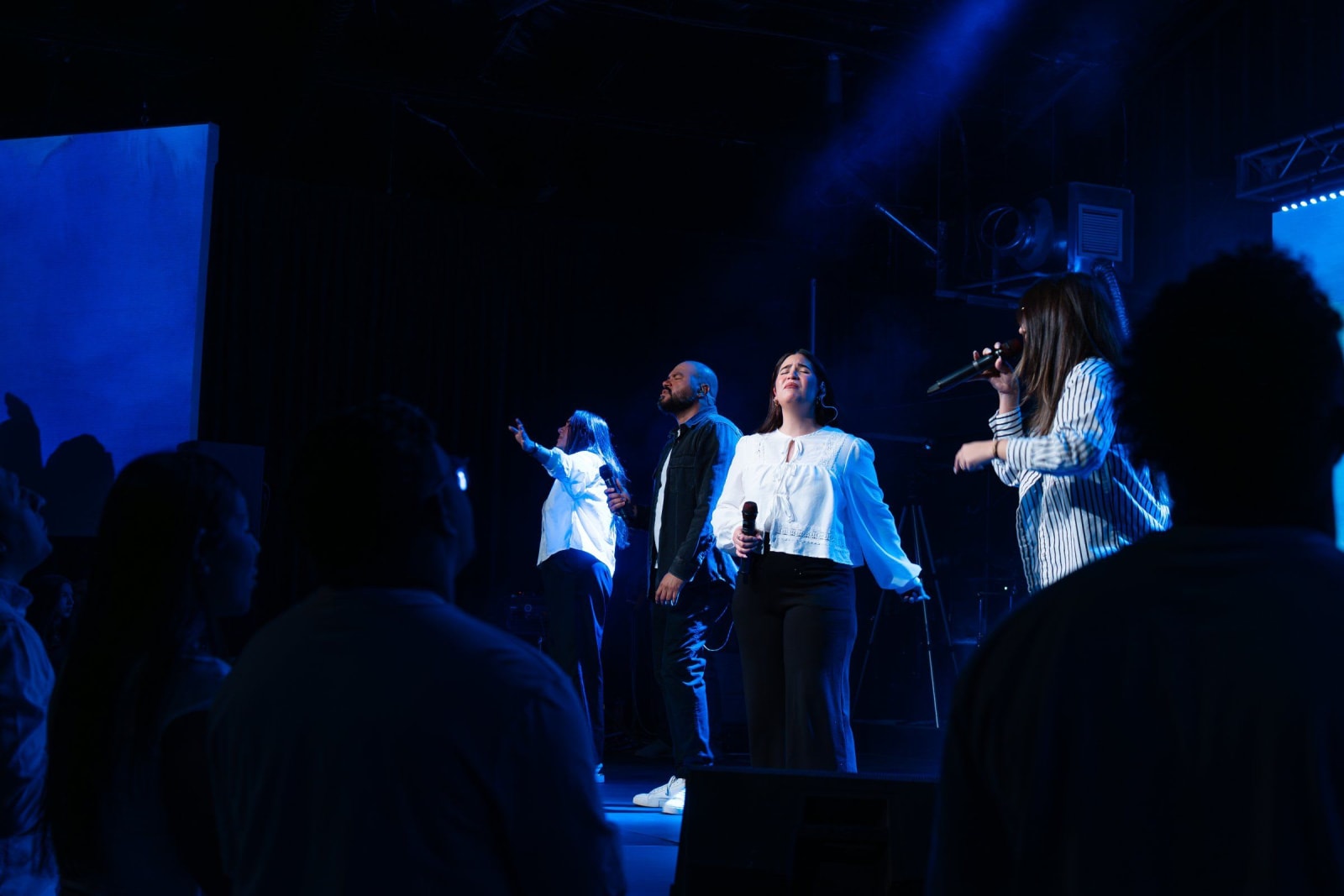 Worship singers performing on stage / duluth