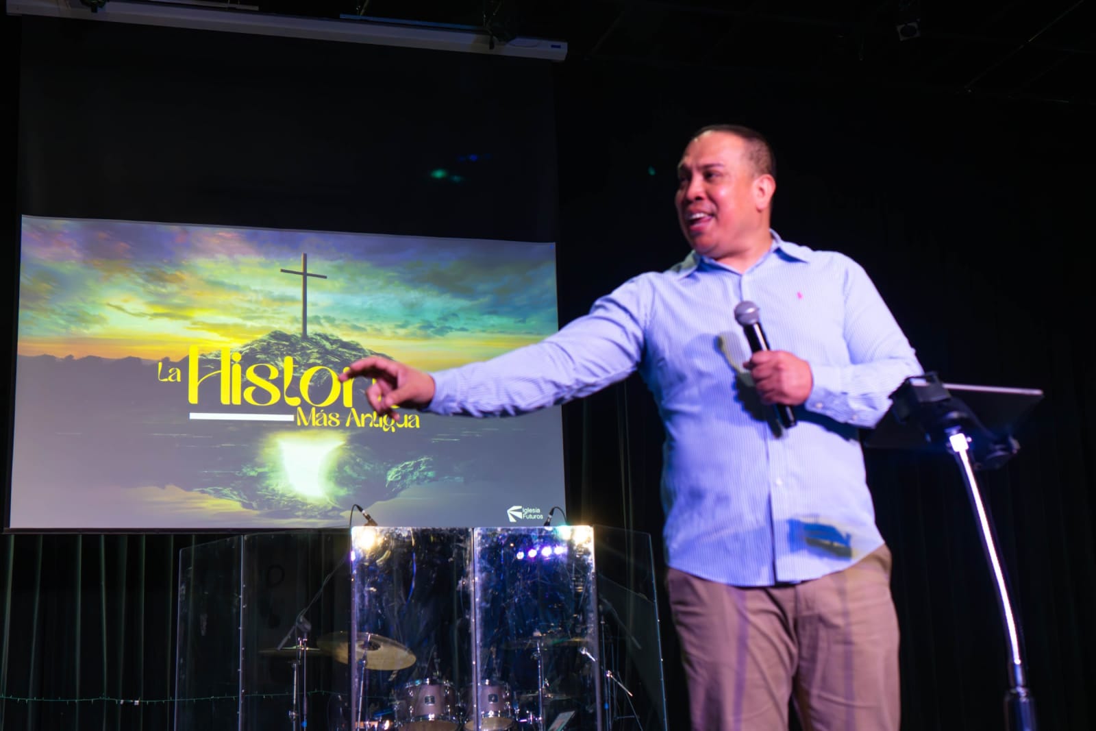 Pastor preaching on stage / grayson