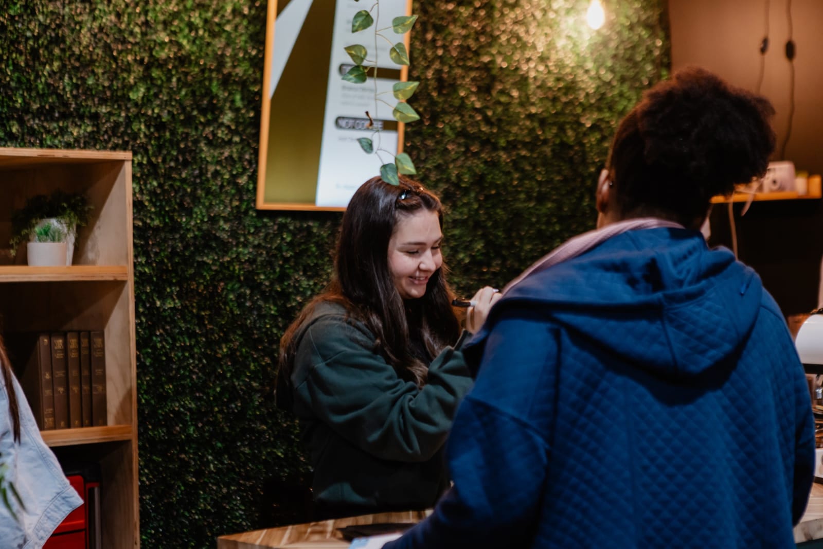 two people chatting and connecting in the welcome area / gwinnett