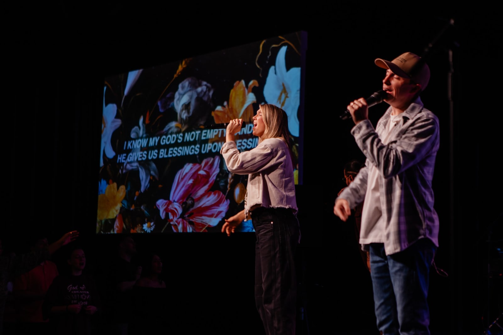 chloe evans on stage singing / gwinnett + stage