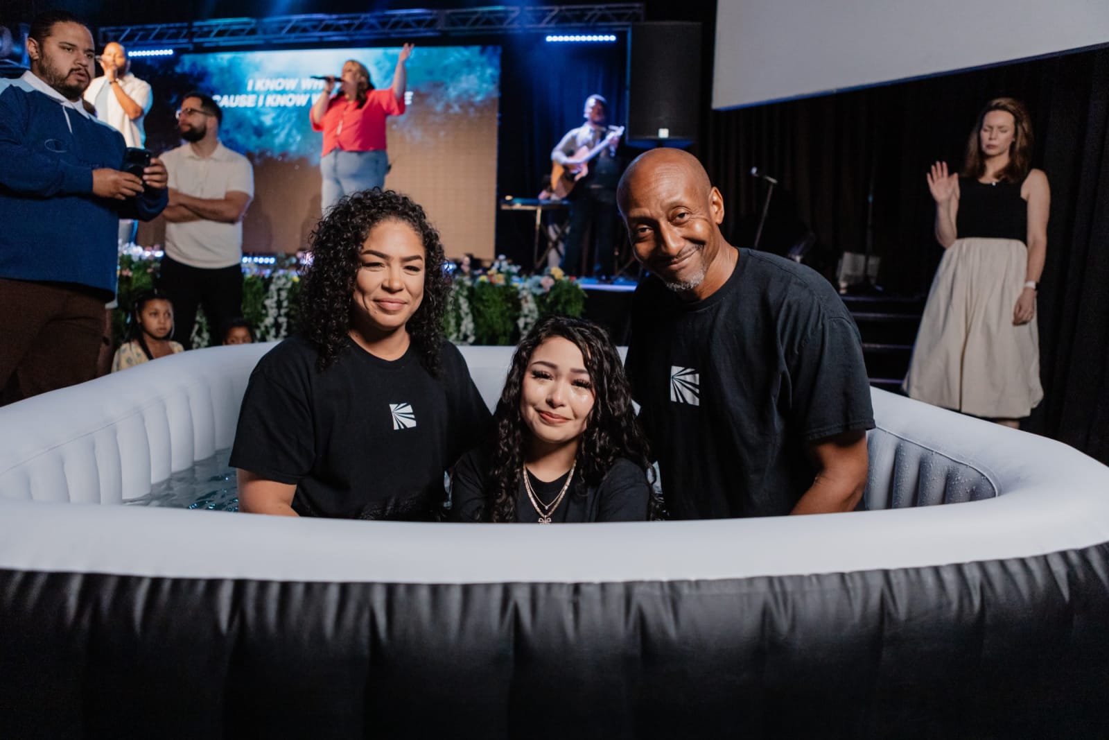young adult woman getting baptised / gwinnett + baptism tank