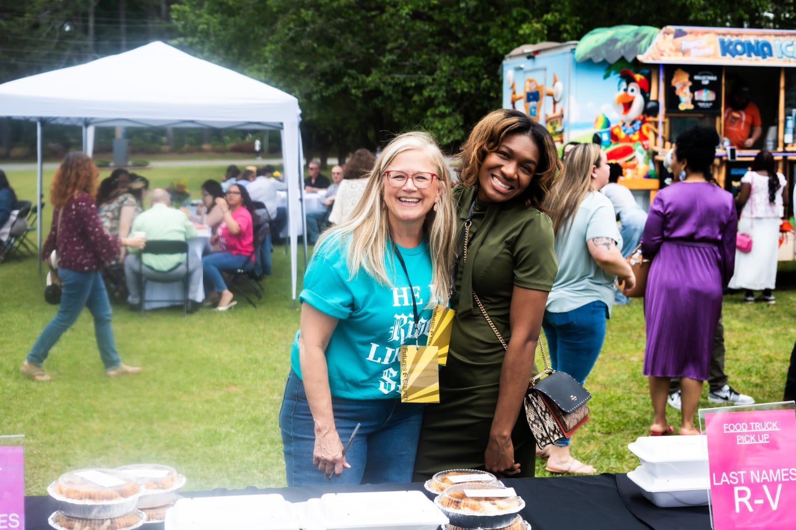 kennesaw women smiling and hugging outside