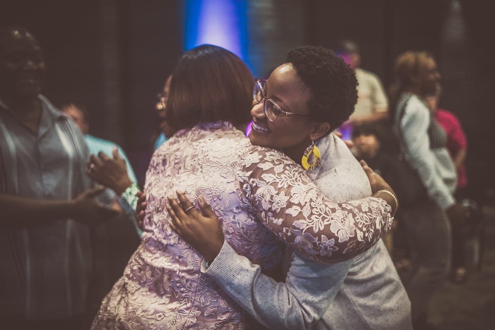 kennesaw african women hugging