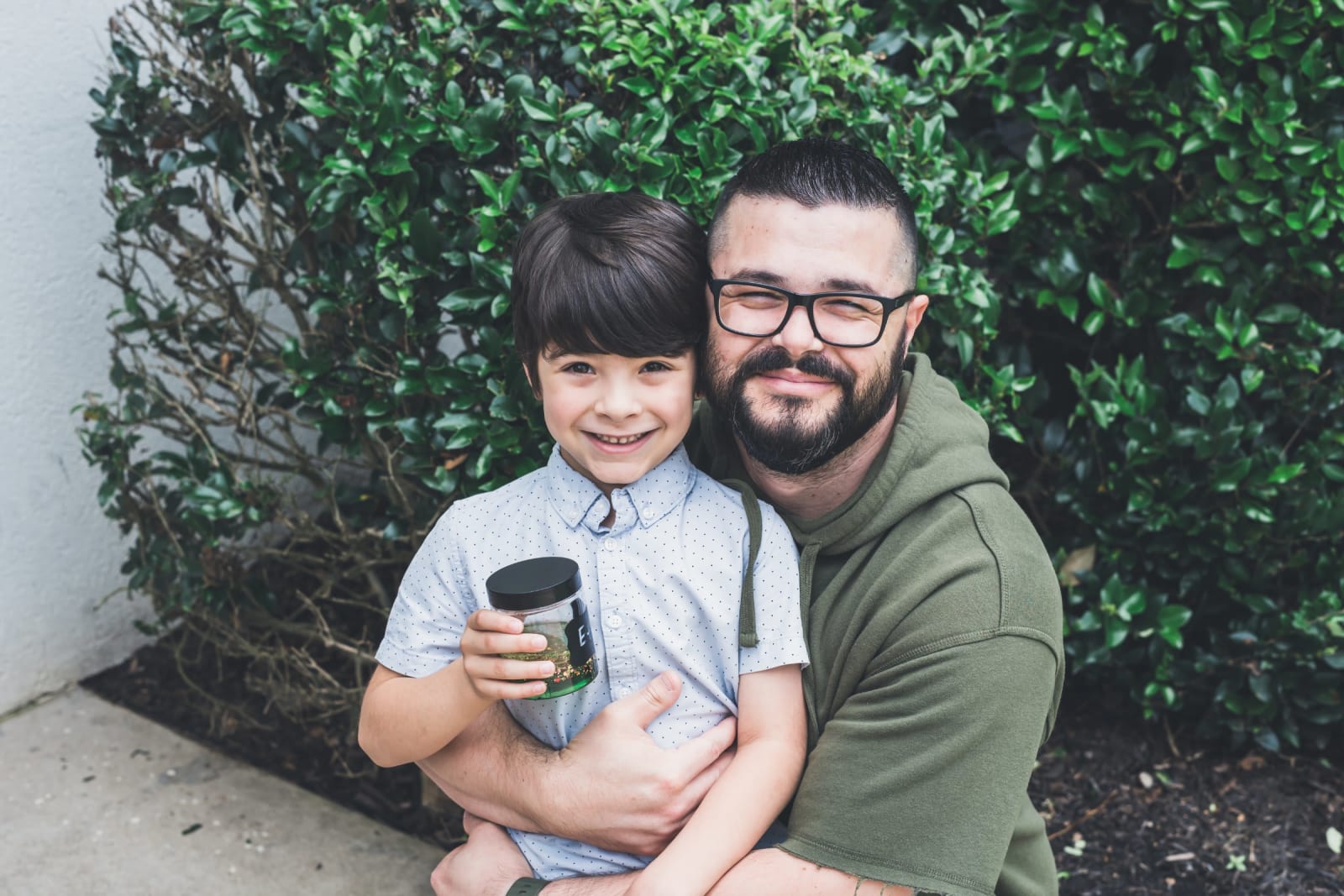 kennesaw dad and son smiling outside church