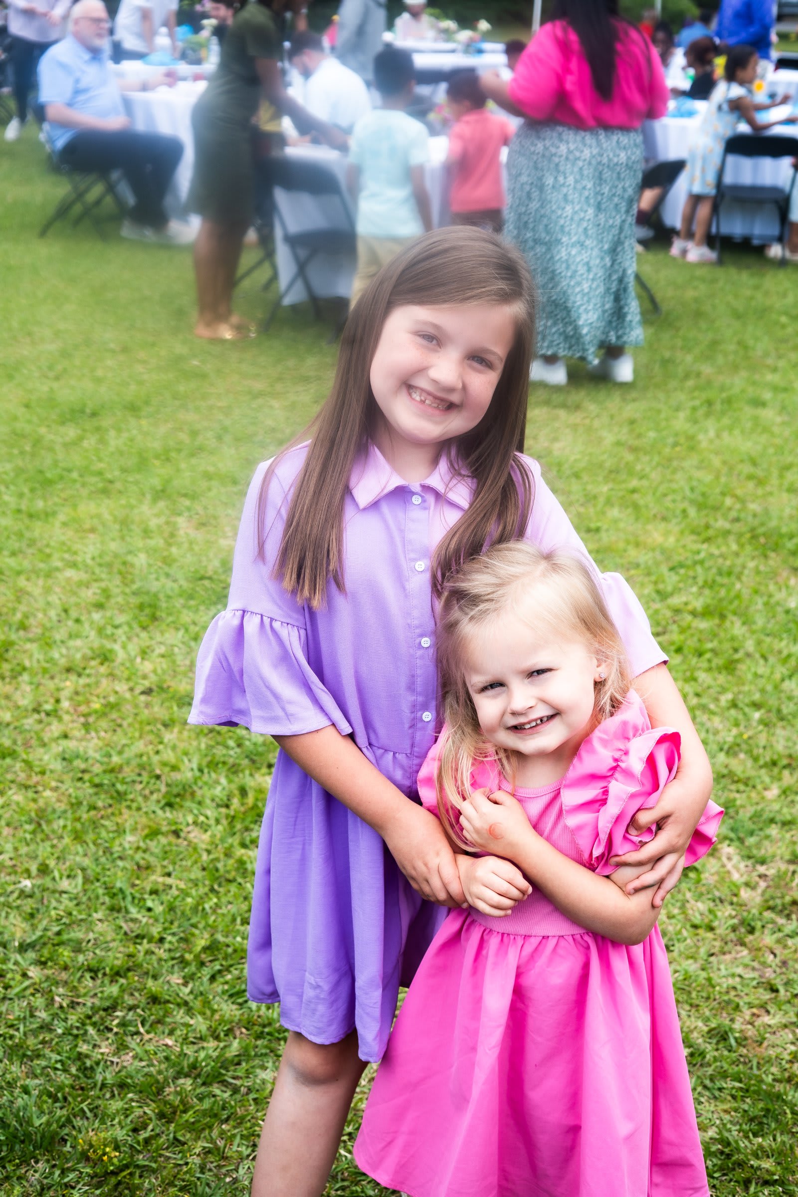 kennesaw 2 girls smiling outside