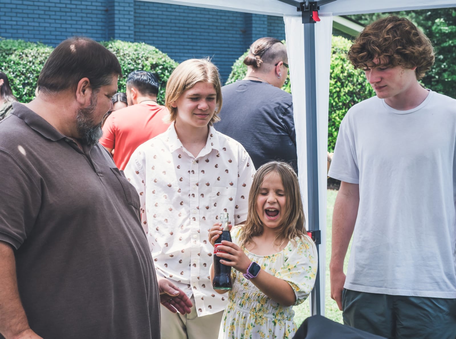 family at outdoor church event / kennesaw