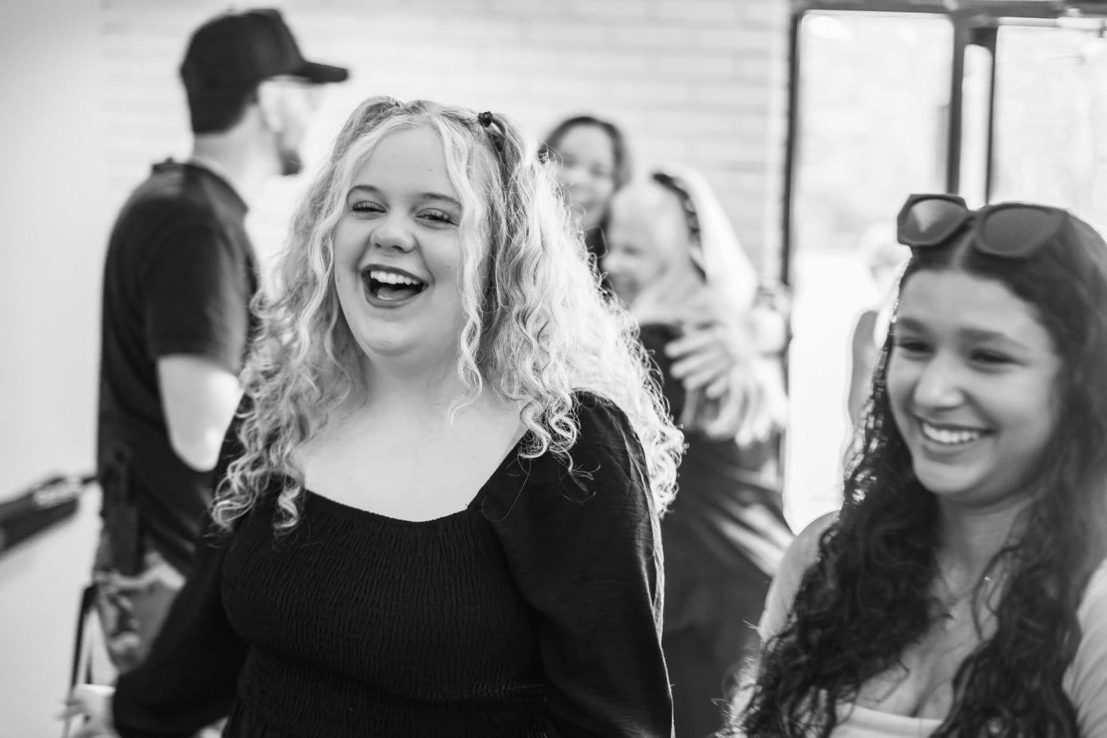 two women laughing black and white photo / kennesaw