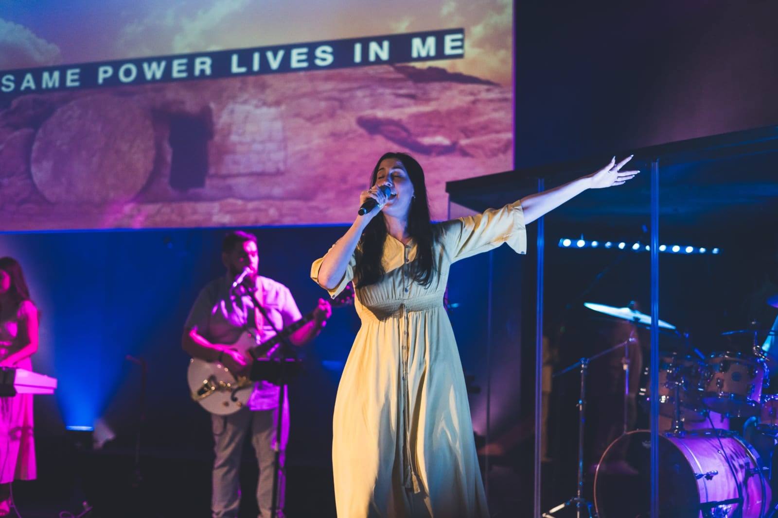 female worship singer on stage / kennesaw