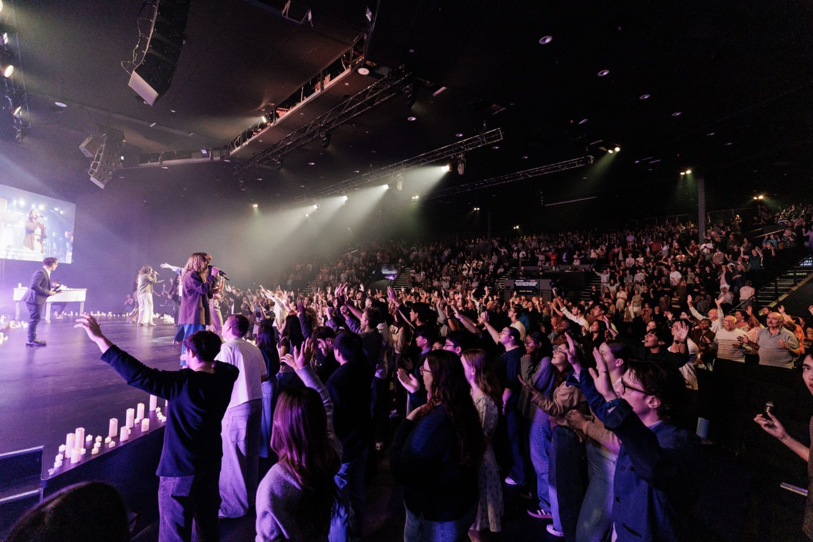 Hands lifted in worship / Futures Paradise