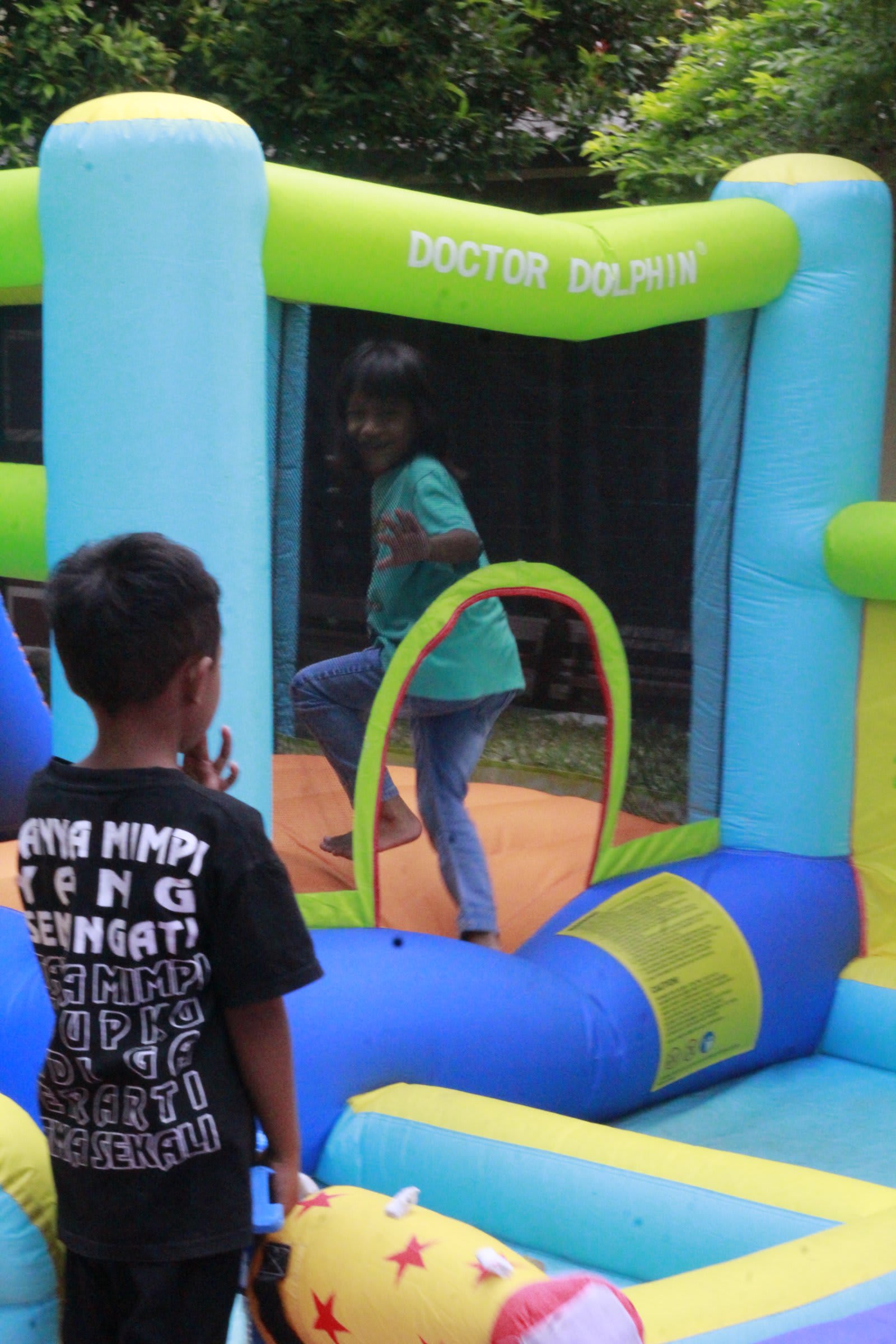 Child playing on inflatable at Solo campus Futures Church kids outdoor fun day