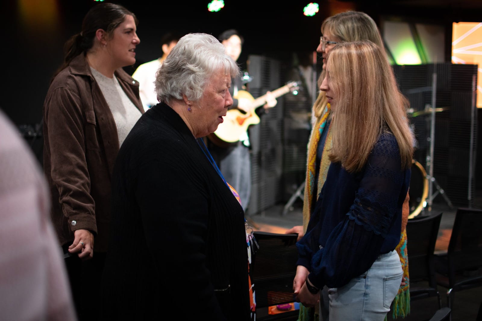 An older woman and a young woman in conversation / victor harbor
