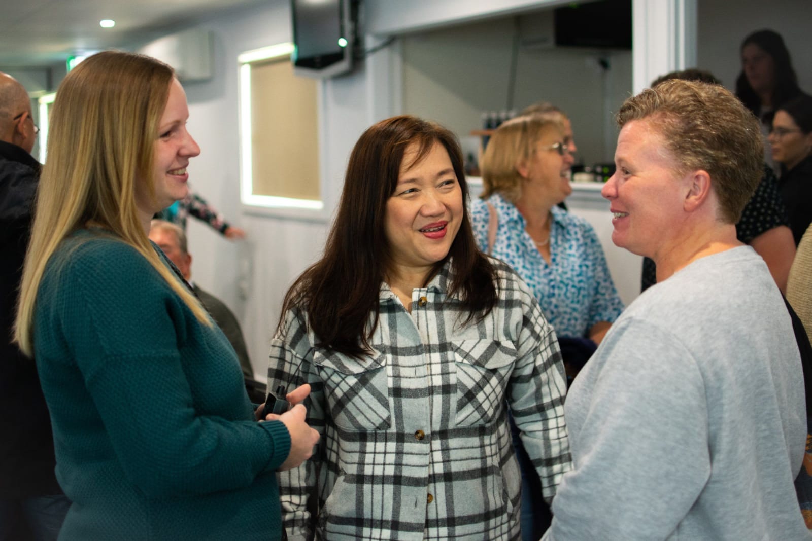 Women chatting and laughing together / victor harbor