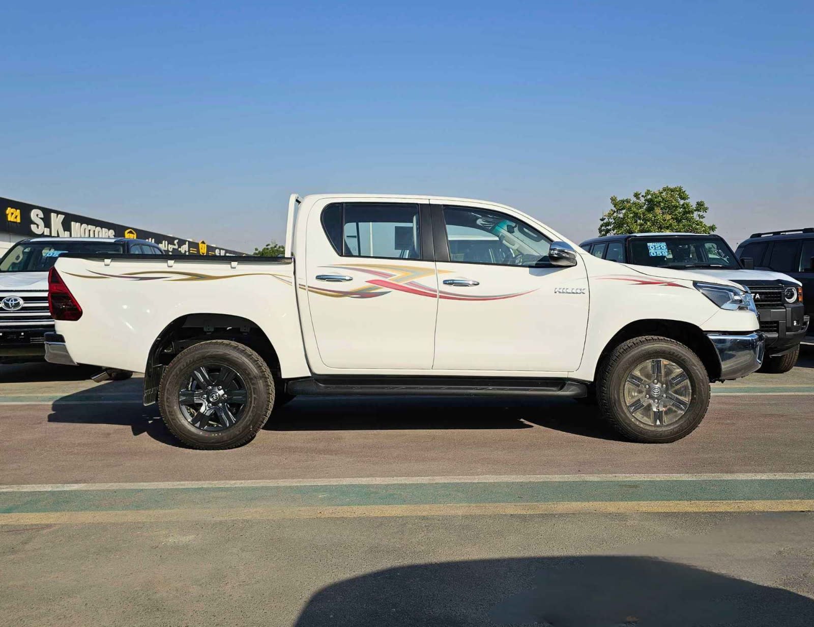 2026-09-03T19:00:00.000Z Toyota Hilux SR5 WIDE BODY DOUBLE CABIN || FULL OPTION  | PUSH START| WITHOUT DIFF-LOCK | PETROL M/T 2.7L V4 4WD (CODE # H27MFG)