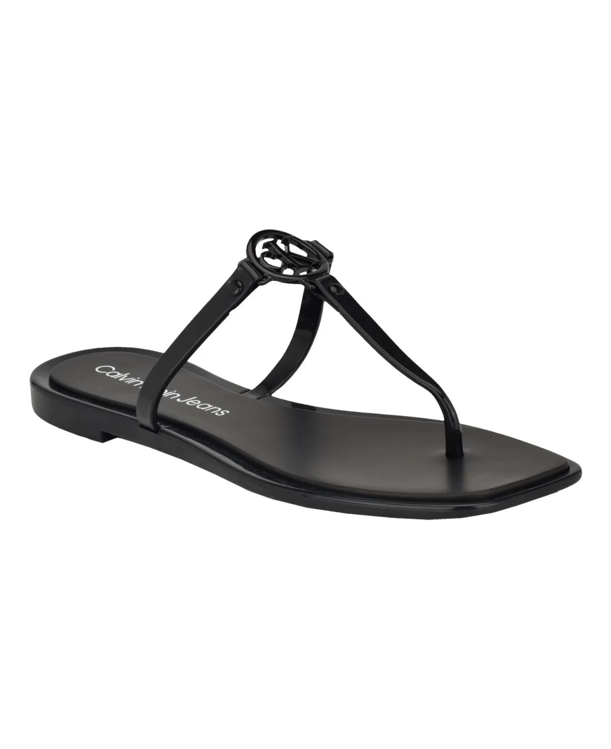 1186366_calvin-klein-womens-edhen-logo-t-strap-flat-jelly-sandals.webp