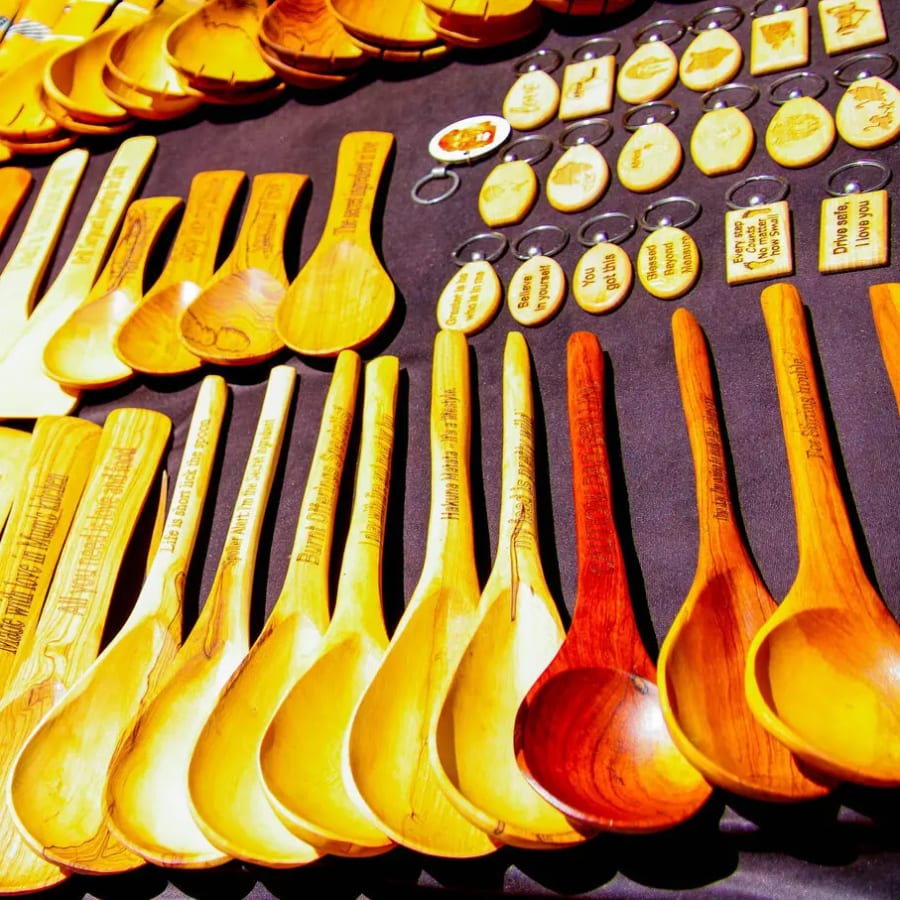 Wooden kitchen utensils featuring wooden spoons and spatulas of various sizes and shades, photo 1