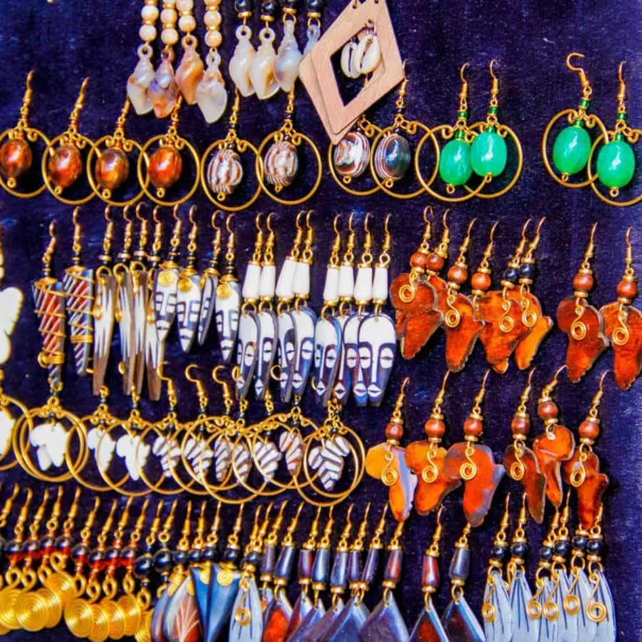 African earrings made from materials such as bone and cowrie shells, photo 1