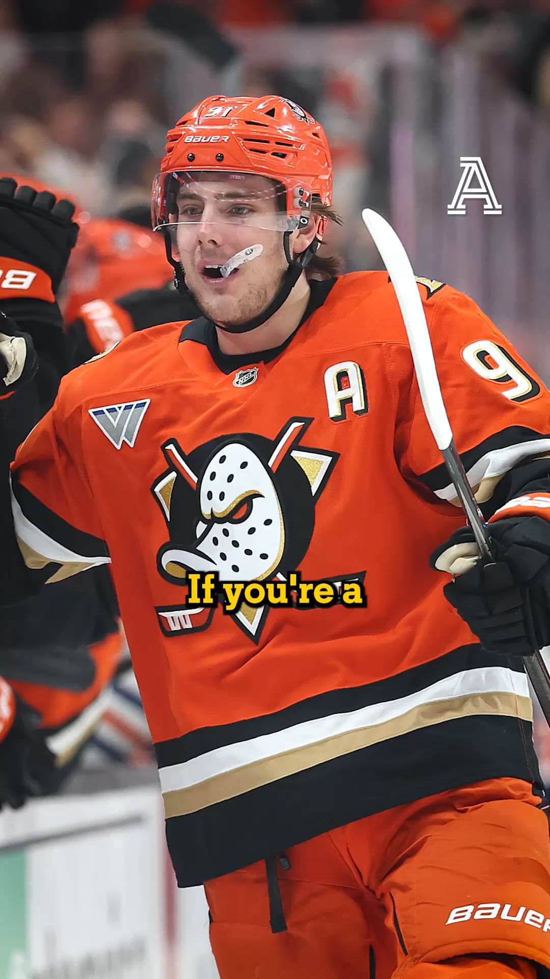 Hockey executives discussing roster moves in a modern arena office, realistic editorial photo