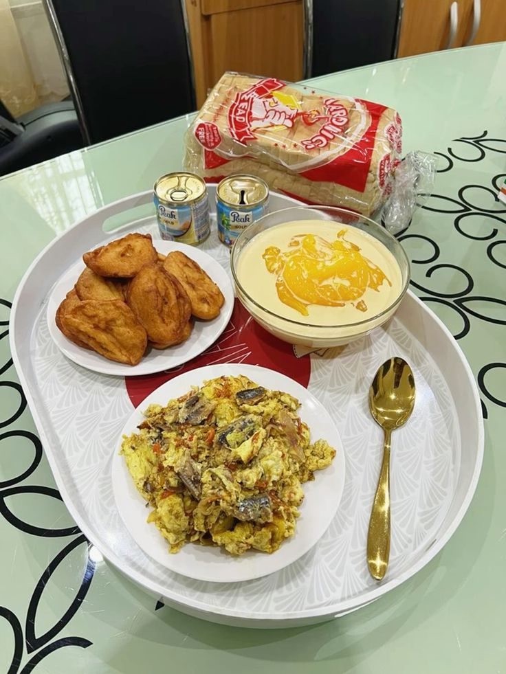 Akara, Bread, Fried eggs and Pap with milk & sugar
